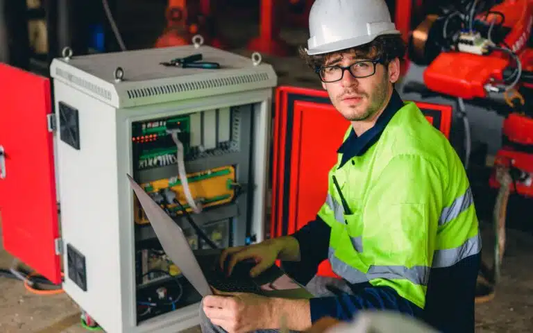 KO-MET Industrietechnik - Prüfungen & Sicherheit 2 technician-engineer-checking-and-repairing-automat-2024-10-11-01-59-42-utc